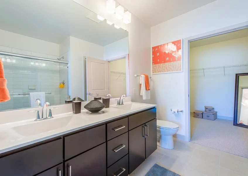 Dual vanities, modern finishes